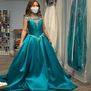 pageant dress size 8, blue green in color